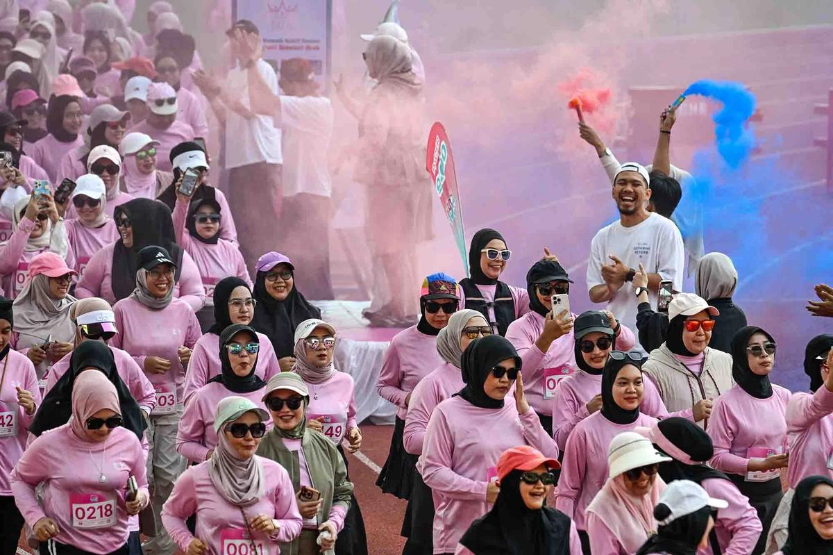 FOTO: Keseruan Lari Santai Khusus Perempuan di Banda Aceh