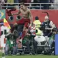 Striker Liverpool Roberto Firmino merayakan golnya ke gawang Flamengo pada laga final Piala Dunia Antarklub di Khalifa International Stadium Doha, Qatar, Minggu (22/12/2019) dini hari WIB. (AP Photo/Hassan Ammar)