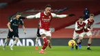 Pemain Arsenal Pierre-Emerick Aubameyang mencetak gol dari titik penalti ke gawang Leeds United pada pertandingan Liga Inggris di Emirates Stadium, London, Inggris, Minggu (14/2/2021). Arsenal menyikat Leeds United 4-2 dengan hattrick dari Pierre-Emerick Aubameyang. (Adam Davy/Pool via AP)