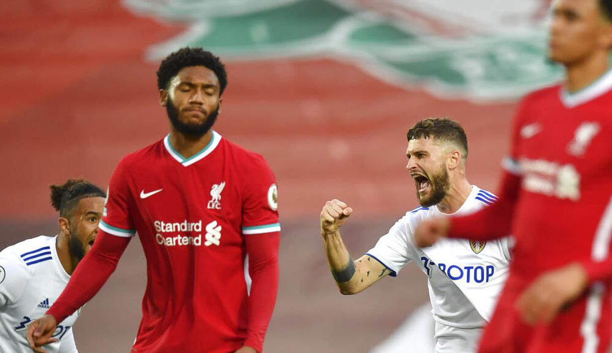 Pemain Leeds United, Mateusz Klich, melakukan selebrasi usai mencetak gol ke gawang Liverpool pada laga Premier League di Stadion Anfield, Minggu (13/9/2020). Liverpool menang dengan skor 4-3. (Paul Ellis, Pool via AP)