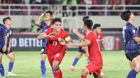 Pemain Timnas Indonesia, Muhammad Ferarri melakukan selebrasi setelah mencetak gol ke gawang Laos pada laga lanjutan Grup B Piala AFF 2024 di Stadion Manahan, Solo, Jawa Tengah, Kamis (12/12/2024). (Bola.com/Abdul Aziz)