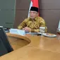 Menko PMK Muhadjir Effendy meminta pimpinan lembaga pendidikan keagamaan untuk mengirimkan data-data terkait jumlah siswa saat rapat koordinasi tingkat menteri, Kamis (11/6/2020). (Dok Kementerian Koordinator Bidang Pembangunan Manusia dan Kebudayaan)