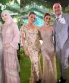 Raisa Andriana hadir di resepsi pernikahan Debi Sagita dan Marco Ivanos dengan floral maxi dress yang menawan. [@raisa6690]