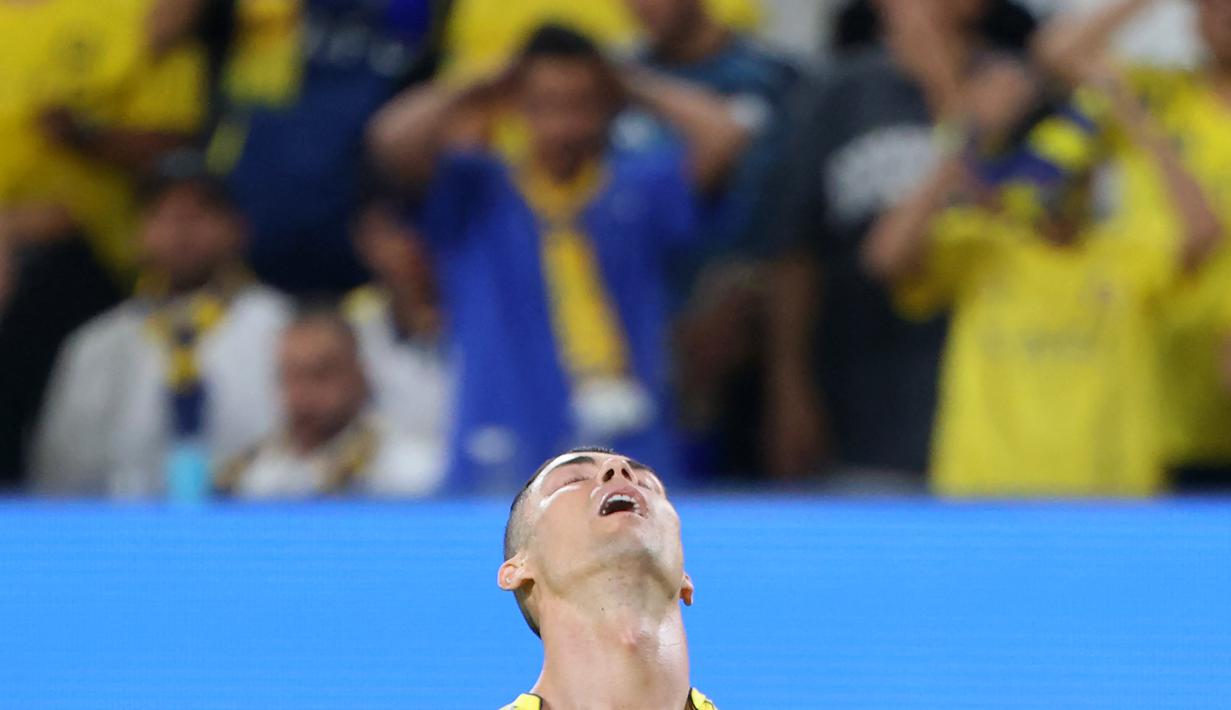 Kegagalan Al Nassr juara ACL 2 membuat Ronaldo belum bisa memberikan trofi dari 14 kompetisi yang diikutinya sejak bergabung tahun 2023 lalu. (AFP/Fayez Nureldine)