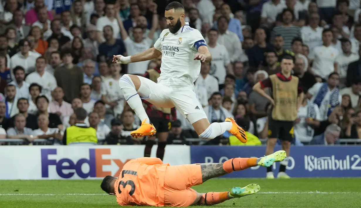 <p>Pertandingan Real Madrid vs Manchester City pada semifinal leg 1 Liga Champions 2022/2023 berakhir imbang 1-1. (AP Photo/Manu Fernandez)</p>