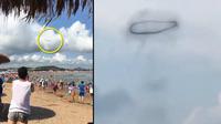 Penampakan misterius diduga UFO di sebuah pantai China. (Pear Video)