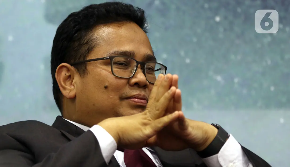Komisioner Bawaslu RI Rahmat Bagja tampil sebagai pembicara dalam Diskusi Empat Pilar MPR di Media Center Parlemen, Gedung Nusantara III Kompleks Parlemen Senayan, Jakarta, Rabu (4/12/2019). Diskusi kali ini mengangkat tema Menuju Pilkada Serentak 2020. (Liputan6.com/Johan Tallo)
