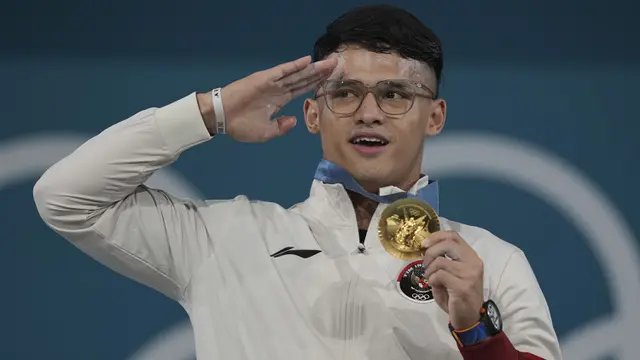 Foto: Pecahkan Rekor Olimpiade, Rizki Juniansyah Sumbang Emas Kedua Indonesia di Olimpiade Paris 2024