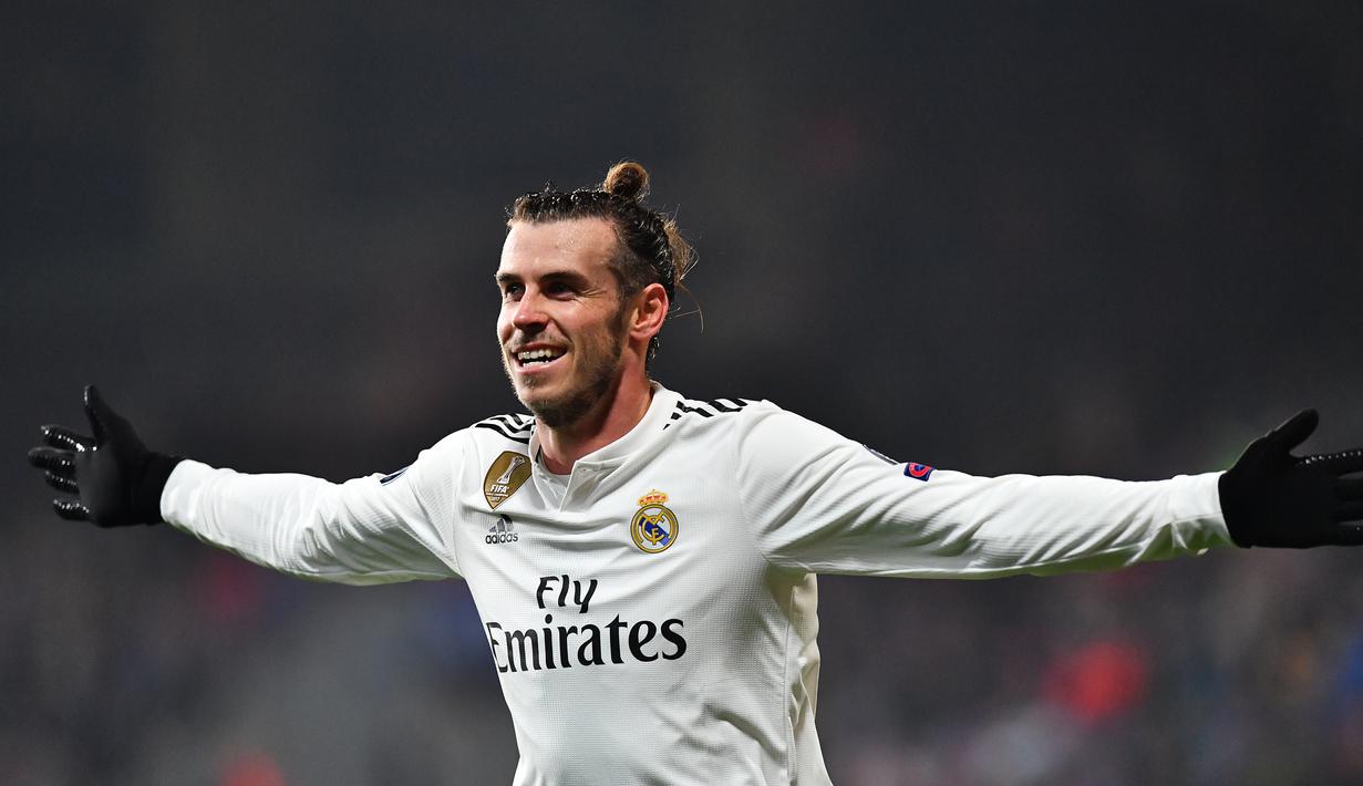 Meski masih mencetak tiga gol, Bale dirasa memiliki kontribusi lebih saat terciptanya banyak gol Madrid. MU membutuhkan Bale karena lini depan yang kurang cakap dan cepat saat menyerang. (AFP/Gabriel Bouys)