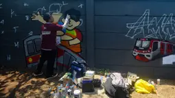 Kesepuluh peserta ini hasil seleksi dari sekitar 206 seniman mural graffiti se-Indonesia yang mendaftar. (merdeka.com/Arie Basuki)