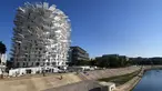 Gambar pada 23 Oktober 2018 menunjukkan sebuah bangunan "Arbre Blanc" atau yang berarti Pohon Putih di Montpellier, Prancis. Gedung ini dirancang oleh arsitek Jepang Sou Fujimoto bersama Nicolas Laisne dan Manal Rachdi dari Prancis. (PASCAL GUYOT/AFP)