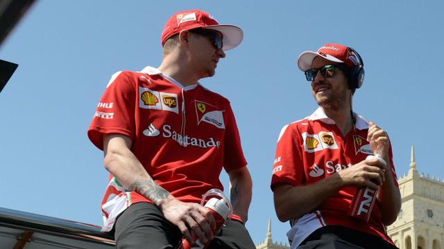 Kimi Raikkonen (kiri) dan Sebastian Vettel.