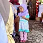 Seorang anak ikuti rangkaian acara Hari Keluarga Nasional 2023 untuk mencegah stunting di Banyuasin, Sumatera Selatan. Kamis (6/7/2023). Foto: Ade Nasihudin/Liputan6.com.