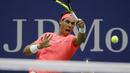 Rafael Nadal mengembalikan bola ke arah lawannya Dusan Lajovic pada babak pertama Tenis AS Terbuka 2017 di Arthur Ashe Stadium, New York,  (29/8/2017). Nadal menang 8-6, 6-2, 6-2. (AP/Frank Franklin II)