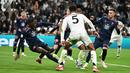 Dua gol Real Madrid di waku normal dicetak Kylian Mbappe dan Vinicius Junior. Celta Vigo memaksakan hasil imbang di waktu normal berkat gol Jonathan Bamba dan penalti Marcos Alonso. (AFP/Javier Soriano)
