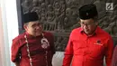 Ketua Umum PKB Muhaimin Iskandar atau Cak Imin (kiri) berbincang bersama Sekjen PDIP Hasto Kristiyanto di Kantor PKB, Jakarta, Selasa (10/4). Pertemuan ini juga membahas terkait dukungan untuk Jokowi di Pilpres 2019. (Liputan6.com/Angga Yuniar)