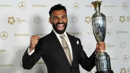 Kesuksesan pemain Mesir tersebut tak lepas dari perannya membawa Liverpool menjadi juara Liga Inggris musim 2024/2025. (AP Photo/PA/Martin Rickett)