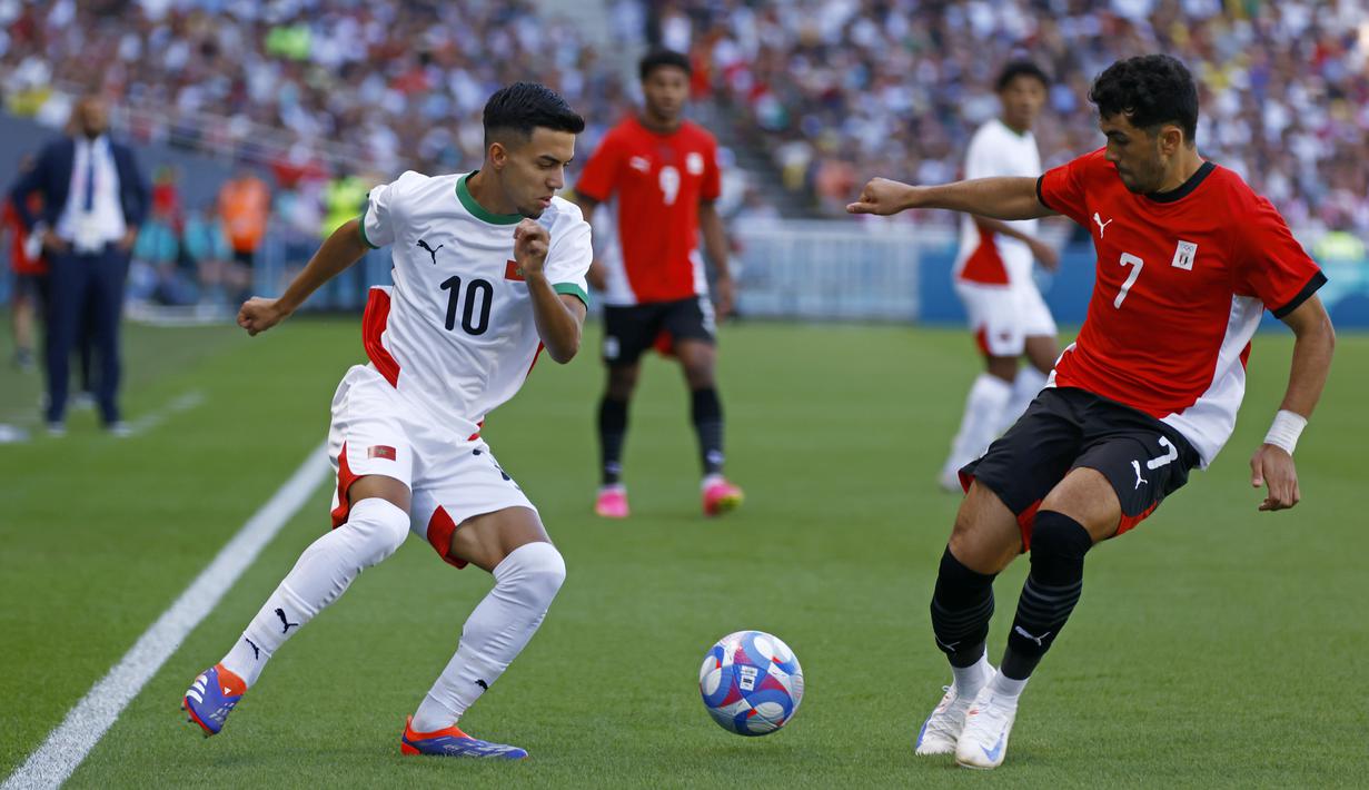 Bagi Timnas Maroko, pencapaian tersebut terasa spesial. Pasalnya, itu adalah medali pertama yang berhasil mereka raih di Olimpiade. Sebelum Olimpiade 2024, pencapaian terbaik Maroko adalah fase grup. (AP Photo/Jeremias Gonzalez)