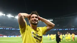 Mats Hummels telah memperkuat Dortmund selama 13 tahun dalam dua periode. (FRANCK FIFE / AFP)