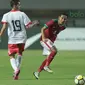 Pemain Timnas Indonesia U-23, Evan Dimas saat melawan Bahrain pada laga PSSI Anniversary Cu 2018 di Stadion Pakansari, Bogor, (26/4/2018). Bahrain menang 1-0. (Bola.com/Nick Hanoatubun)