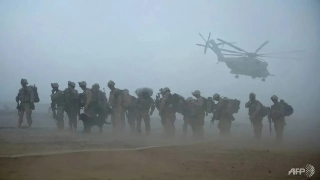 Pasukan AS, digambarkan di provinsi Helmand pada tahun 2009, akan keluar dari Afghanistan pada 11 September 2021. (AFP / MANPREET ROMANA)
