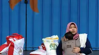 Bulog akan dibantu PT Pos Indonesia dalam mendistribusikan bantuan beras ke seluruh penjuru negeri. (merdeka.com/Imam Buhori)