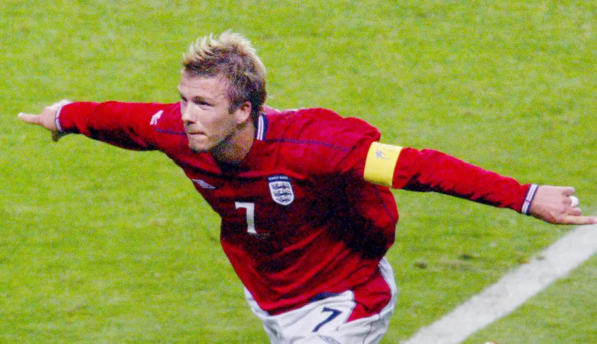 David Beckham merupakan salah satu pesepak bola paling populer di dunia. Tidak hanya piawai dalam mengolah Si Kulit Bundar, Suami dari Victoria ini juga pandai dalam berpenampilan. (AFP/Odd Andersen)