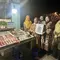 Pemasangan sertifikat halal di kedai UMKM di Kampung Ujung, Labuan Bajo, Nusa Tenggara Timur (NTT), dalam rangkaian puncak acara Festival Syawal 1445 H LPPOM MUI, 8 Mei 2024. (Liputan6.com/Asnida Riani)