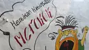 Mural bertuliskan “Hetikan Kebiasaan Merokok di tembok lingkungan RW 06 Kelurahan Kayu Manis, Matraman, Jakarta, Jumat (8/10/2021). Warga sejumlah RT di RW 06 berkomitmen menjaga lingkungan dari asap rokok dengan memberikan teguran dan sanksi bagi yang melanggar. (Liputan6.com/Herman Zakharia)