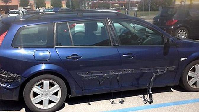 069342300_1439292577-medium_news-flash-gelombang-panas-melelehkan-mobil-di-parkiran-9057ec
