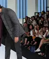 Untuk pertama kalinya anak pasangan Titi Kamal dan Christian Sugiono melenggang di atas panggung catwalk. Arjuna Zayan Sugiono berjalan diatas catwalk bersama dengan ayahnya. (Deki Prayoga/Bintang.com)