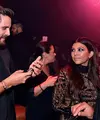 Kourtney Kardashian dan Scott Disick sepertinya menikmati kebersamaan mereka di pesta ulang tahun Kylie Jenner. (David Becker-WireImage- HollywoodLife)