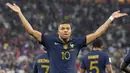 Brace yang dicetak Mbappe sukses membawa Prancis menjadi tim pertama yang lolos ke 16 besar Piala Dunia 2022. (AP Photo/Martin Meissner)