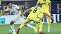 Gelandang Real Madrid, Casemiro, menyebut timnya masih banyak kekurangan setelah bermain imbang 2-2 melawan Villarreal pada laga pekan ketiga La Liga 2019-2020, Minggu (1/9/2019). (AP Photo/Alberto Saiz)