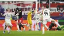 Benfica secara dramatis mengamankan jatah turun kasta ke Liga Europa setelah menang 1-3 dari RB Salzburg. (AP Photo/Matthias Schrader)
