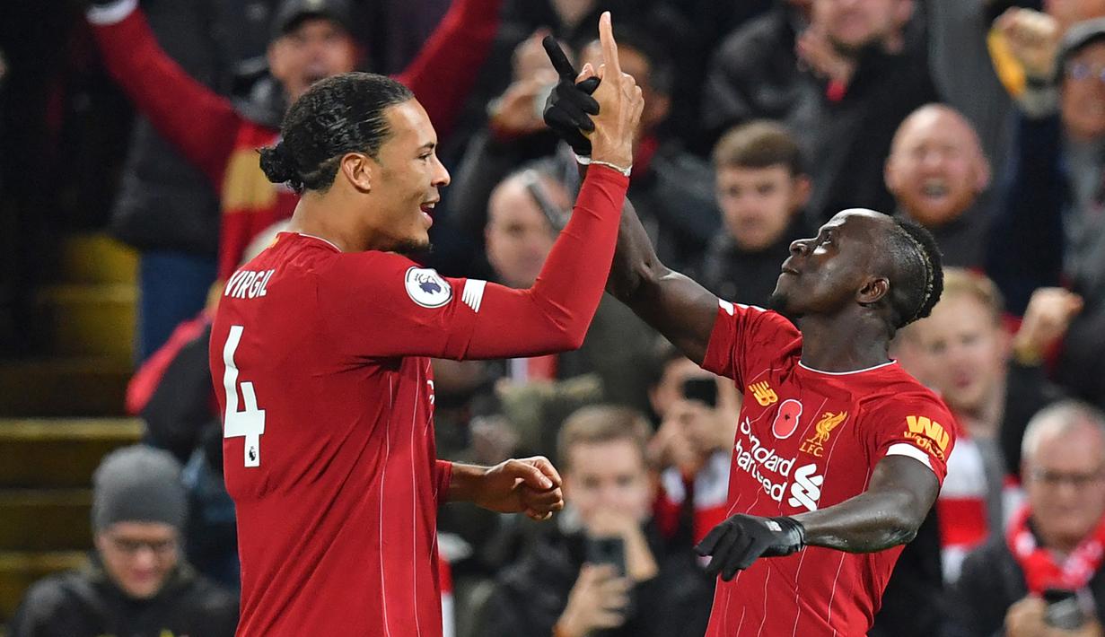 Di Grup A, dua pemain Liverpool, Sadio Mane (Senegal) dan Virgil van Dijk (Belanda) akan saling berhadapan di matchday pertama Grup A sekaligus partai pembuka Piala Dunia 2022 Qatar, 21 November 2022. (AFP/Paul Ellis)