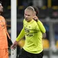 Penyerang Borrusia Dortmund, Erling Haaland berselebrasi usai mencetak gol ke gawang Besiktas pada pertandingan Grup C Liga Champions di Signal Iduna Park, Jerman, Rabu (8/12/2021). Dortmund menang telak atas Besiktas dengan skor 5-0. (AP Photo/ Martin Meissner)