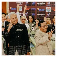 Melihat penampilan Ganjar Pranowo dan Mahmud MD yang kenakan beskap ramah lingkungan usia debat keempat (@ganjar_pranowo)