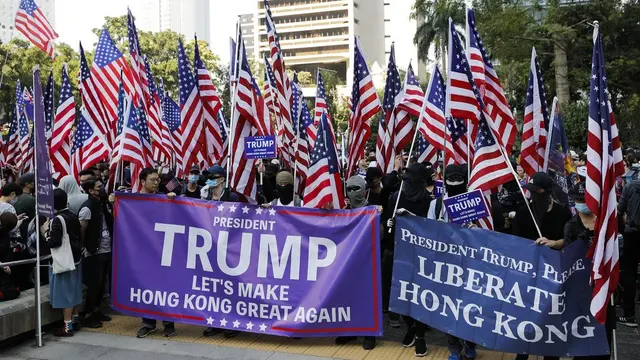 Demonstrasi digelar untuk berterima kasih kepada anggota parlemen dan presiden AS Donald Trump atas dukungannya pada Hong Kong. (AFP)