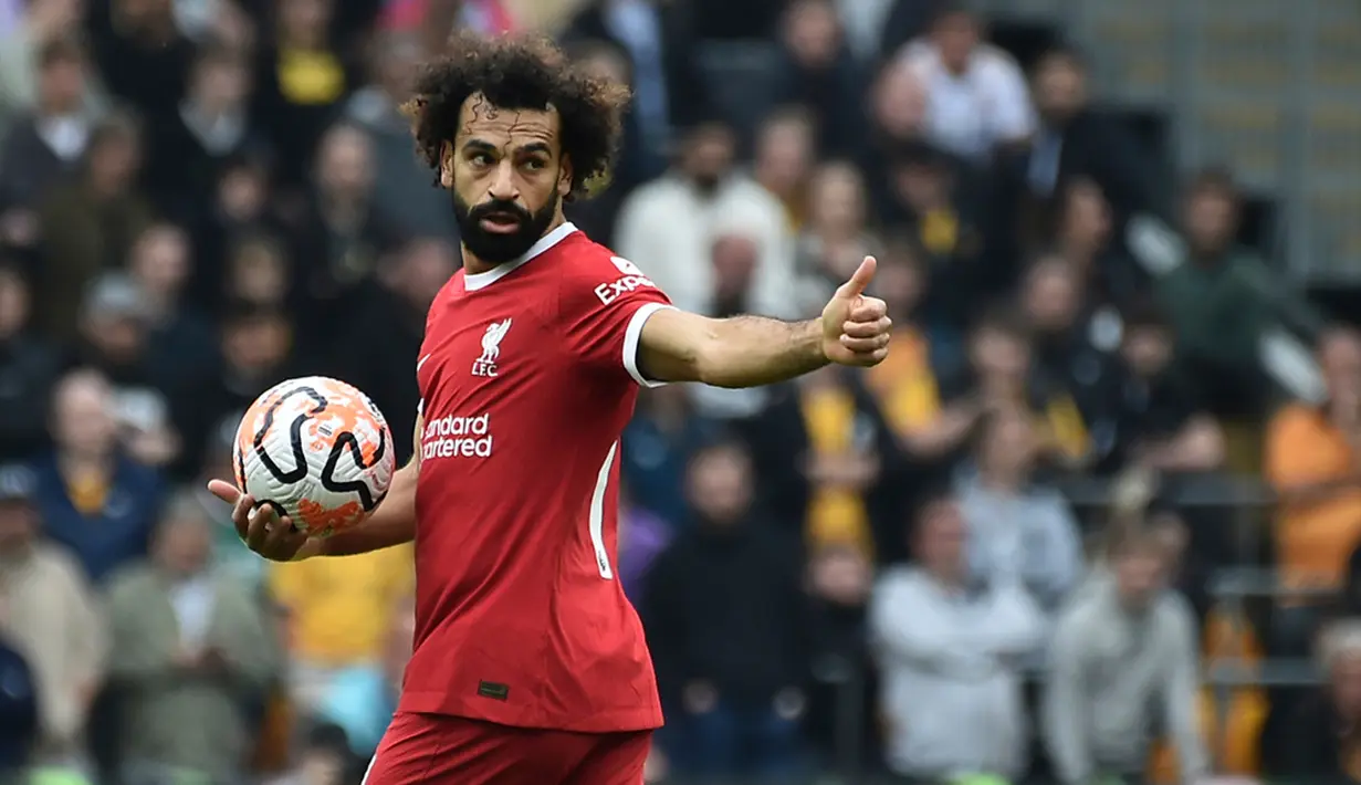 Liverpool akhirnya menyamakan skor saat Mohamed Salah mencetak gol pada menit ke-55. Dia manfaatkan umpan Cody Gakpo sehingga membuat skor 1-1. (AP Photo/Rui Vieira)