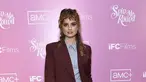 Debby Ryan berpose saat menghadiri pemutaran perdana "Spin Me Round," di The London di West Hollywood, California (17/8/2022).  Aktris berkebangsaan Amerika yang lahir pada 13 Mei 1993 ini tampil cantik dengan kemeja dan jas serta celana berwarna biru.  (Photo by Jordan Strauss/Invision/AP)