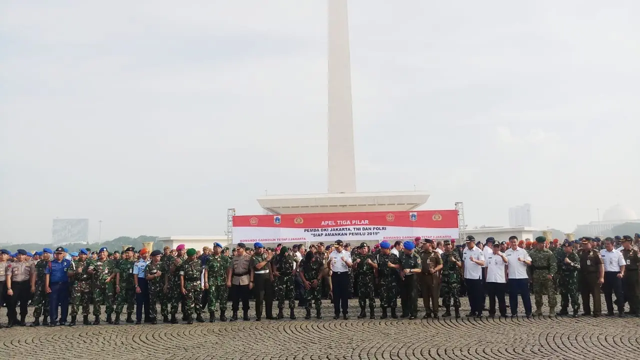 Gubernur DKI Jakarta Anies Baswedan Saat Memimpin Apel Pengamanan Pemilu 2019 di Monas. (Foto: Liputan6.com/Delvira Hutabarat)