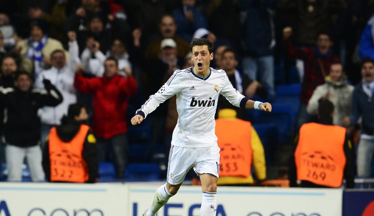 Real Madrid keluar sebagai pemenang usai keluarkan biaya 15 juta euro demi membawa Ozil ke Bernabeu. Namun permainan Ozil di Madrid tak secemerlang permainannya di timnas Jerman. (AFP/Javier Soriano)