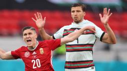 Ruben Dias yang sering disebut sebagai penerus Ronaldo, kurang bisa tampil maksimal, padahal ia selalu dimainkan Portugal dari menit awal. Penampilannya yang dinanti-nanti harus kandas usai Portugal tumbang 1-0 dari Belgia di babak 16 besar. (Foto: AFP/Pool/Alex Pantling)