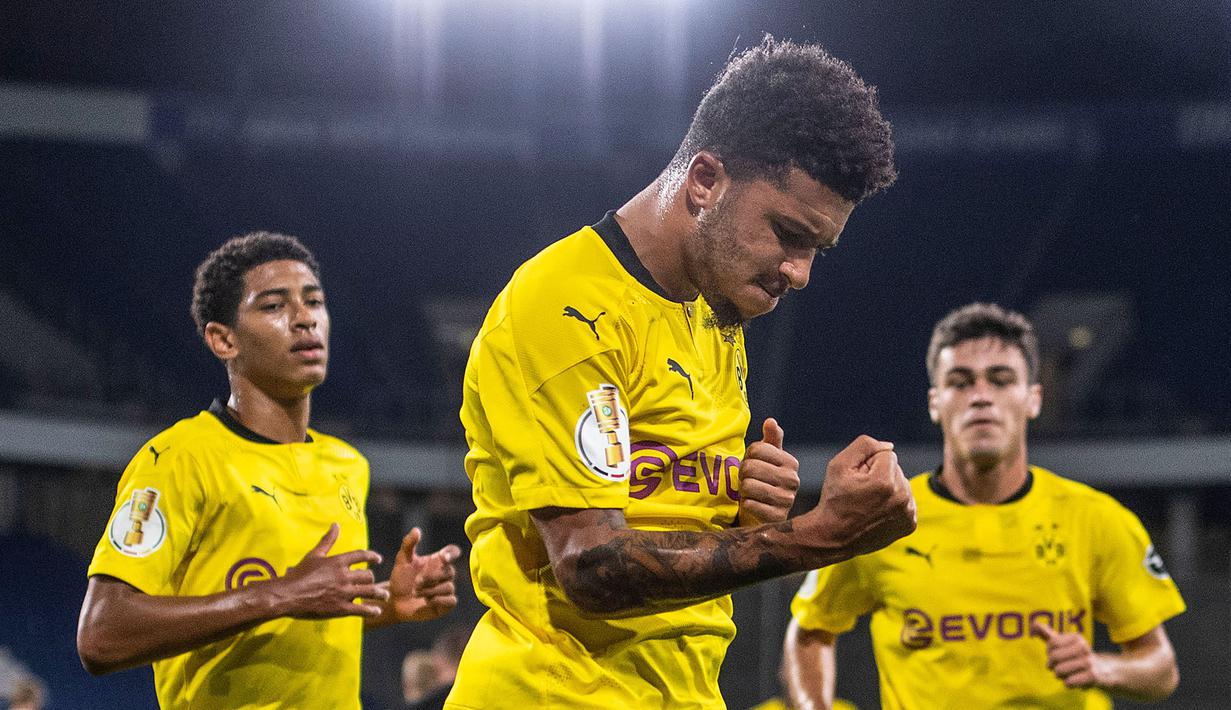 Gelandang Borussia Dortmund, Jadon Sancho, merayakan gol yang dicetaknya ke gawang MSV Duisburg pada laga DFB-Pokal di Schauinsland-Reisen-Arena, Selasa (15/9/2020). Borussia Dortmund menang 5-0 atas MSV Duisburg. (AFP/Marius Becker/dpa)