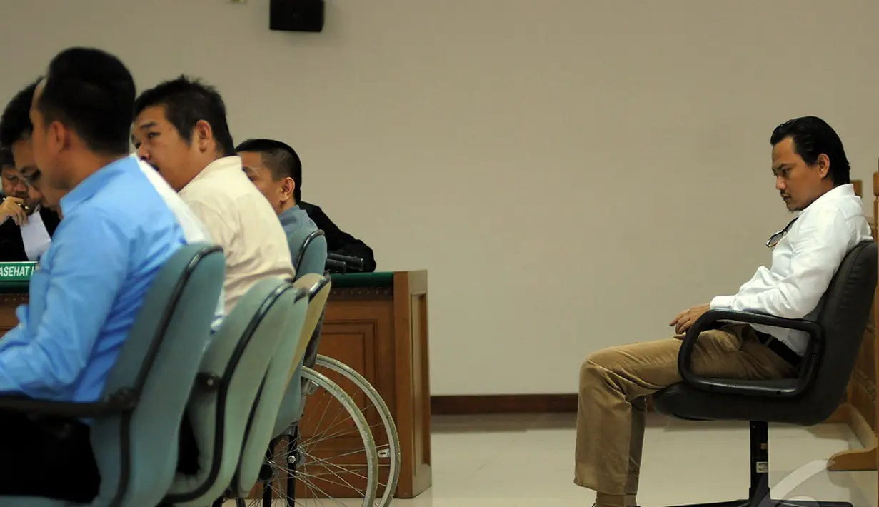 Sebaliknya, ia hanya duduk dibelakang saksi-saksi lainnya dan hanya mendengarkan, Pengadilan Tipikor, Jakarta, Rabu (18/6/2014) (Liputan6.com/Faisal R Syam)