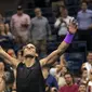 Rafael Nadal merayakan kemenangan atas Diego Schwartzman pada perempat final AS Terbuka 2019 di Arthur Ashe Stadium, Rabu (4/9/2019) atau Kamis siang WIB. (AFP/Don Emmert)