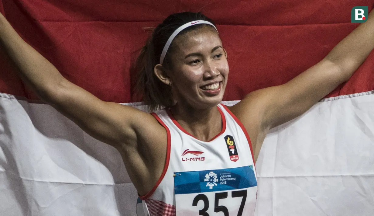 Pelari Indonesia, Emilia Nova, saat berlaga pada nomor 100 meter lari gawang Asian Games di SUGBK, Jakarta, Minggu (26/8/2018). Emilia Nova berhasil menyabet medali perak setelah membukukan waktu 13,33 detik. (Bola.com/Vitalis Yogi Trisna)