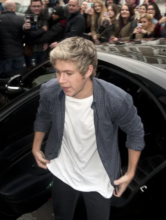 Keputusan Niall Horan dan para personel One Direction lainnya harus menjadi kabar kurang menyenangkan bagi penggemar setia mereka di seluruh dunia. (Bintang/EPA)