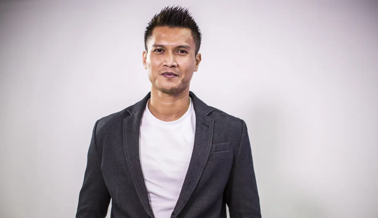Kiper Persija Jakarta, Shahar Ginanjar, saat hadir pada Indonesian Soccer Awards 2019 di Studio Indosiar, Jakarta, Jumat (10/12). Acara ini diadakan oleh Indosiar bersama APPI. (Bola.com/Yoppy Renato))
